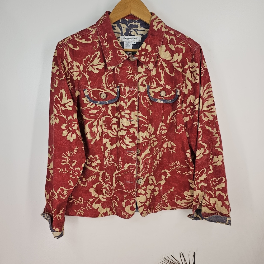 Red canvas jacket with beige floral design by Coldwater Creek. Size Medium.